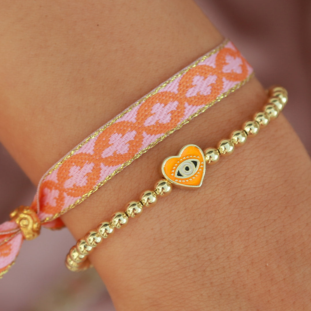 Armband evil eye orange heart gold